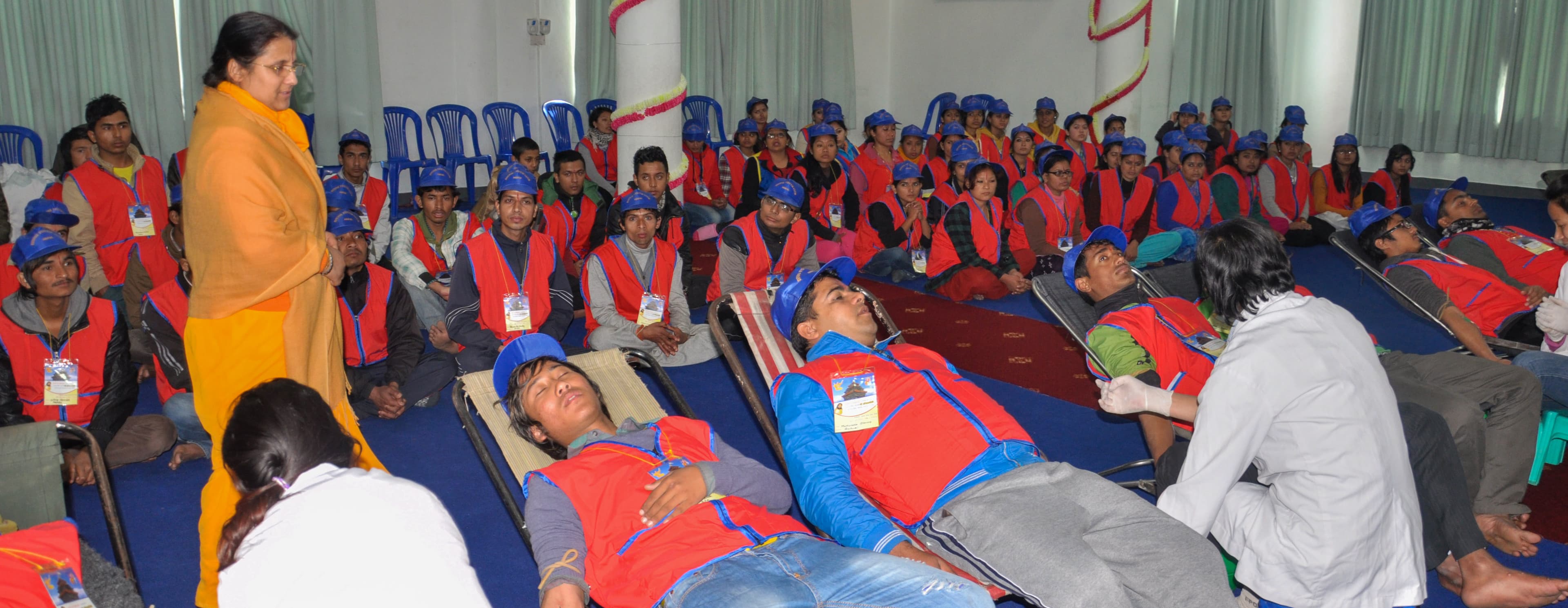Sangita didi observing blood donation by Divine Youth Club Nepal